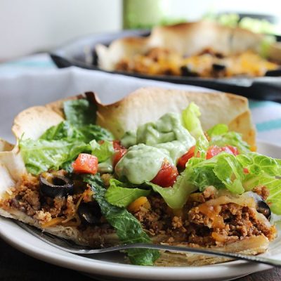 Deep dish taco pizza on plate