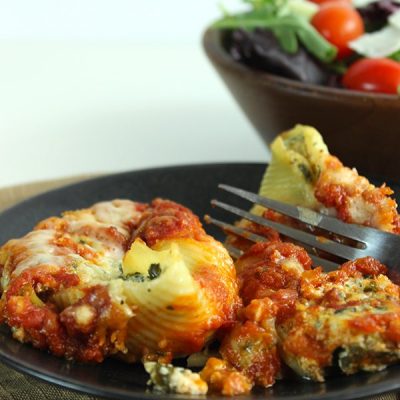Spinach lasagna rolls on plate
