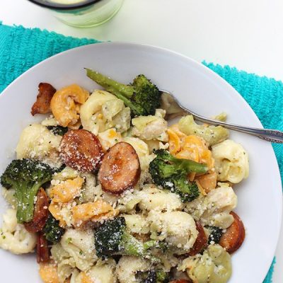 Roasted sausage and broccoli alfredo on plate