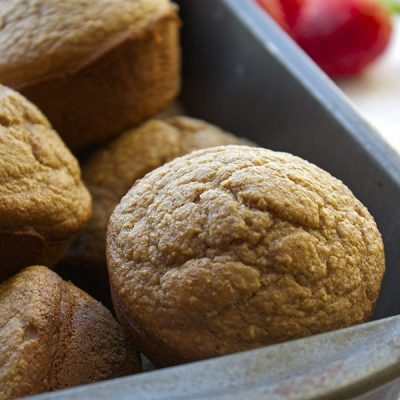 Cinnamon apple muffins in dish on counter
