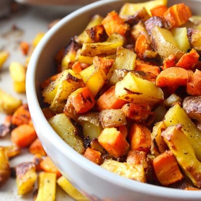 Roasted carrots and potatoes in bowl