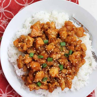 Sweet and sour chicken slow cooker on white plate