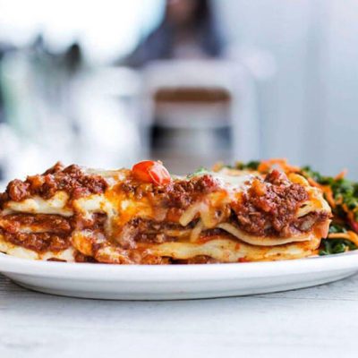 lasagna slice on white plate