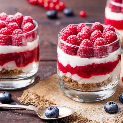 Raspberry Trifle Mousse in glass on wood counter