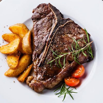 steak with potatoes on plate